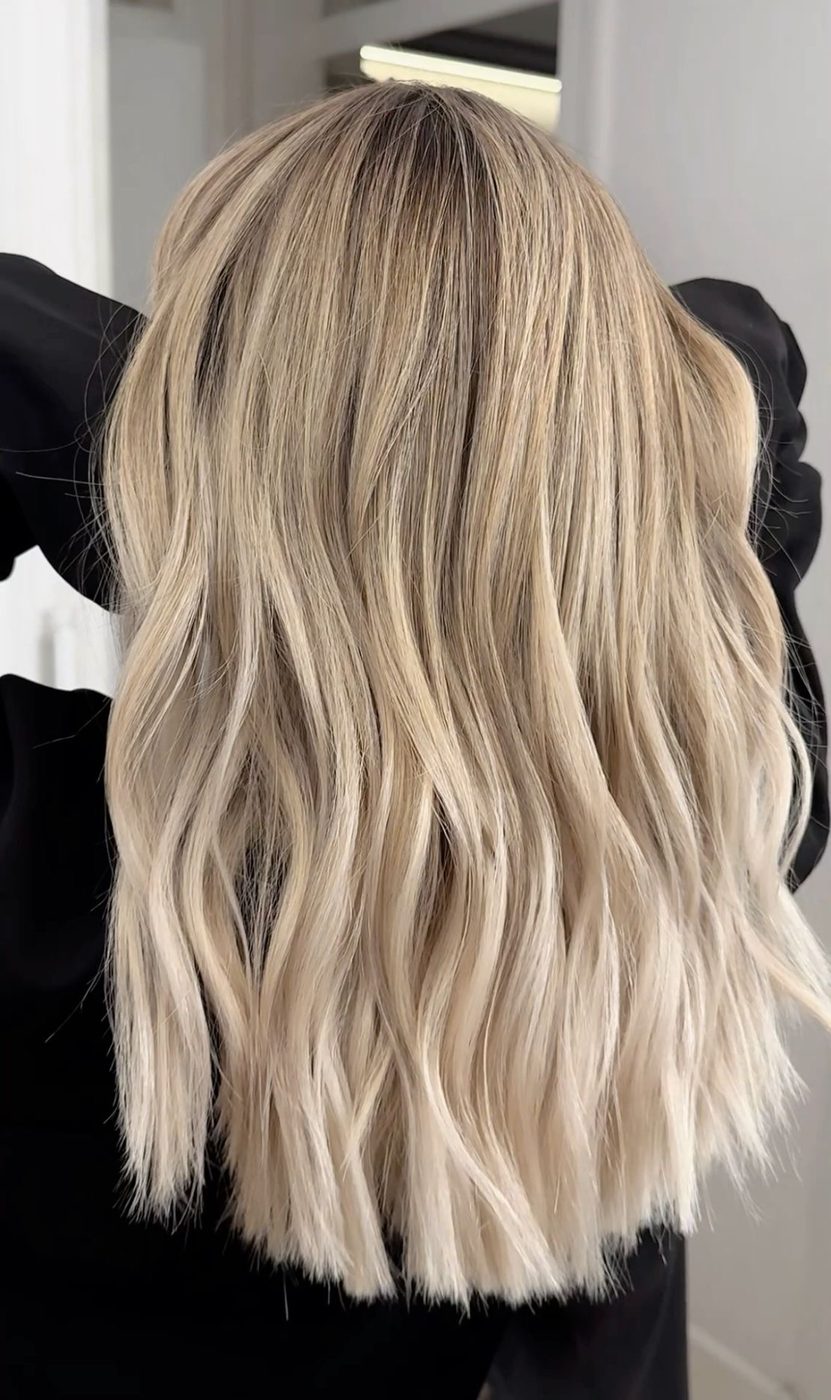 Blonde balayage with waves at LUV Beauty Club Miami