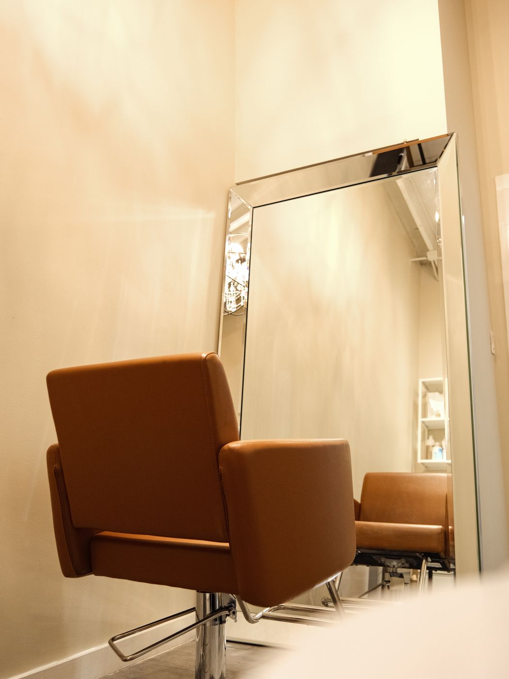 Hair styling chair and mirror at LUV Beauty Club Miami